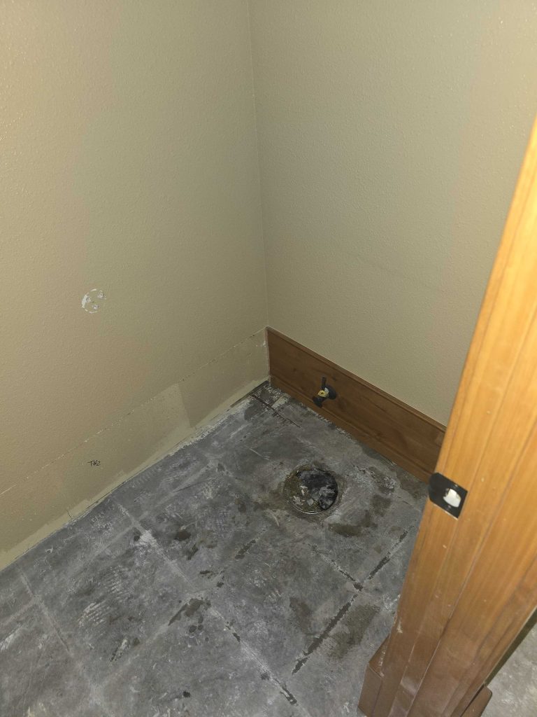 bathroom demolition removing shower tile 