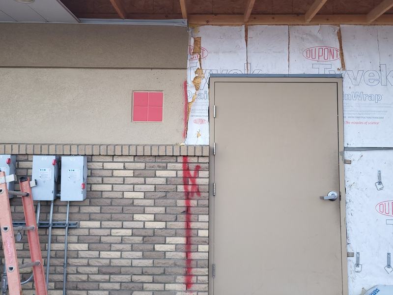 Single-story building and cleared lot ready for structural demolition
